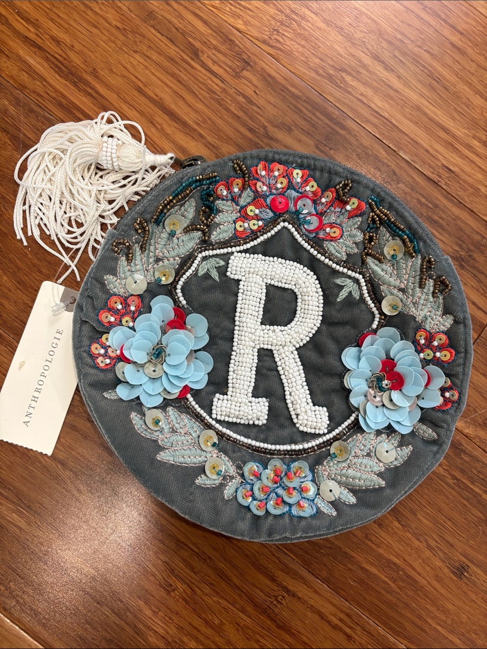 Anthropologie Gray Round Beaded Floral 'R' Clutch with Tassel
